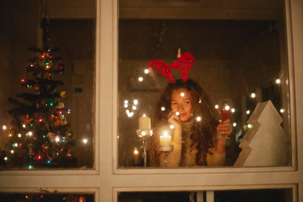 Giving Wine For A Gift with Unlit Artificial Christmas Trees